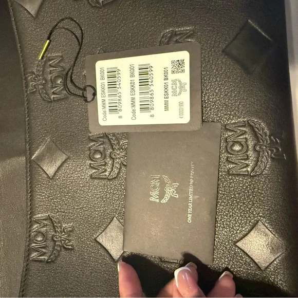 MCM Embossed Black Leather Messenger Bag - Picture 4 of 6